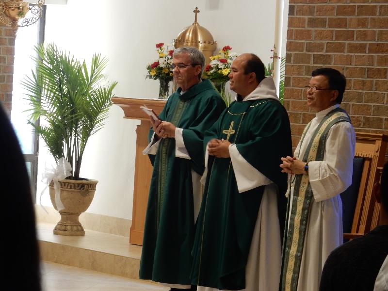 Father Lopez celebrates Mass